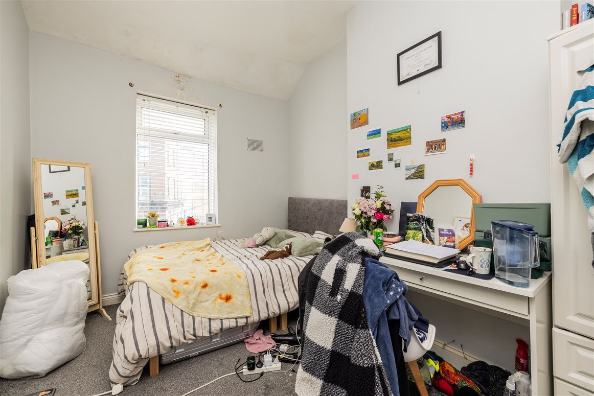 Original bedroom image used for AI-powered interior redesign